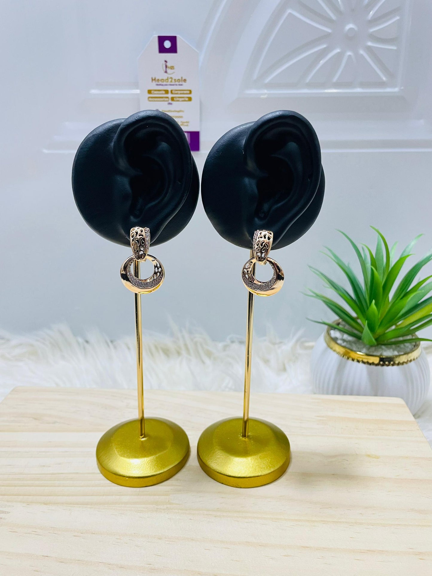 Crystal accent drop gold tone earrings
