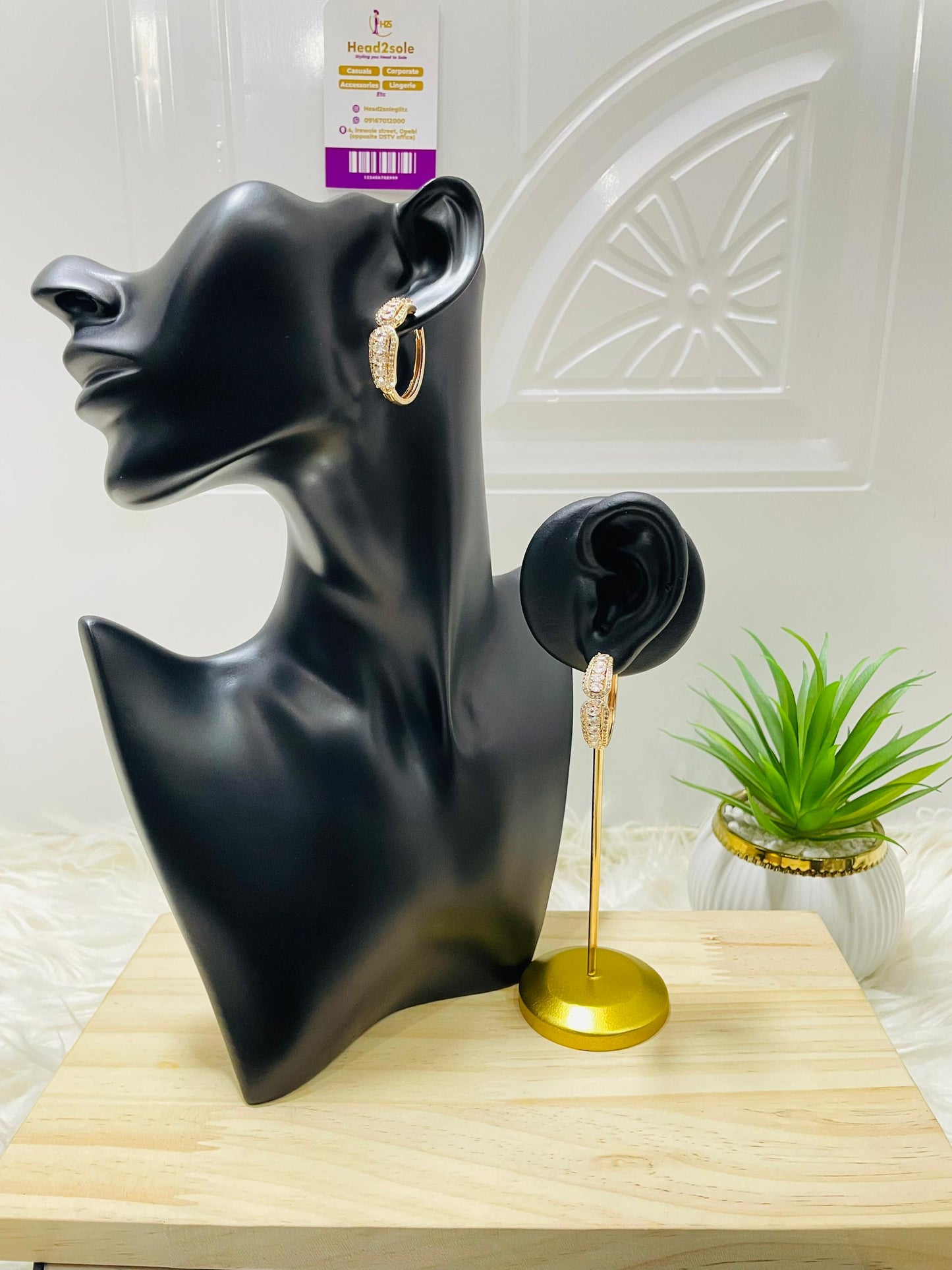 Crystal accent hoop gold tone earrings