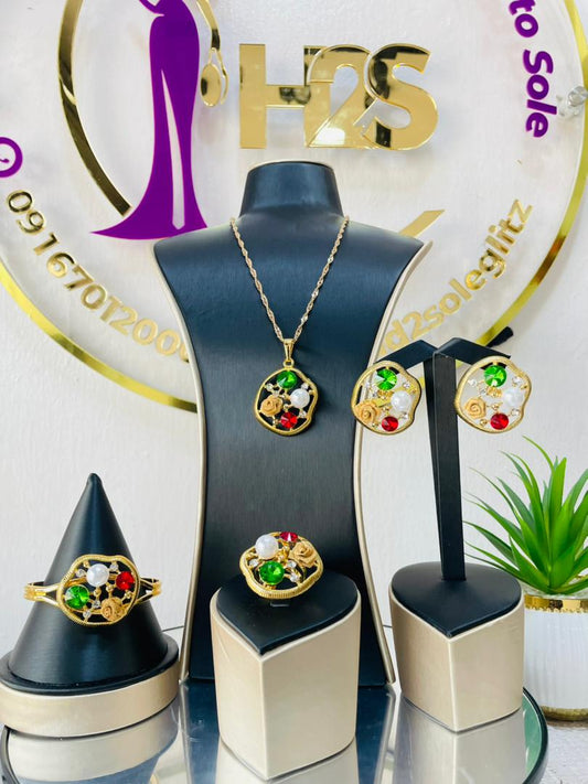 4 piece gold tone jewelry set (Pendant, Bracelet, Earrings and Ring)