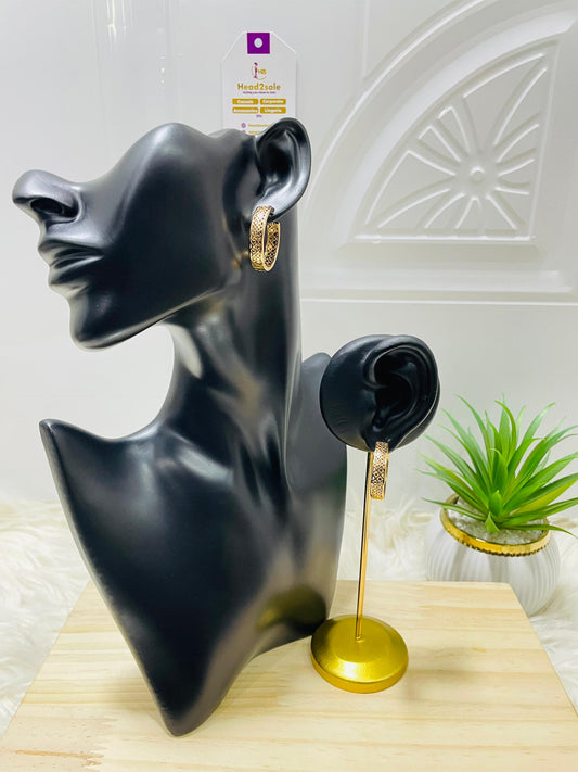Gold tone net hoop earrings