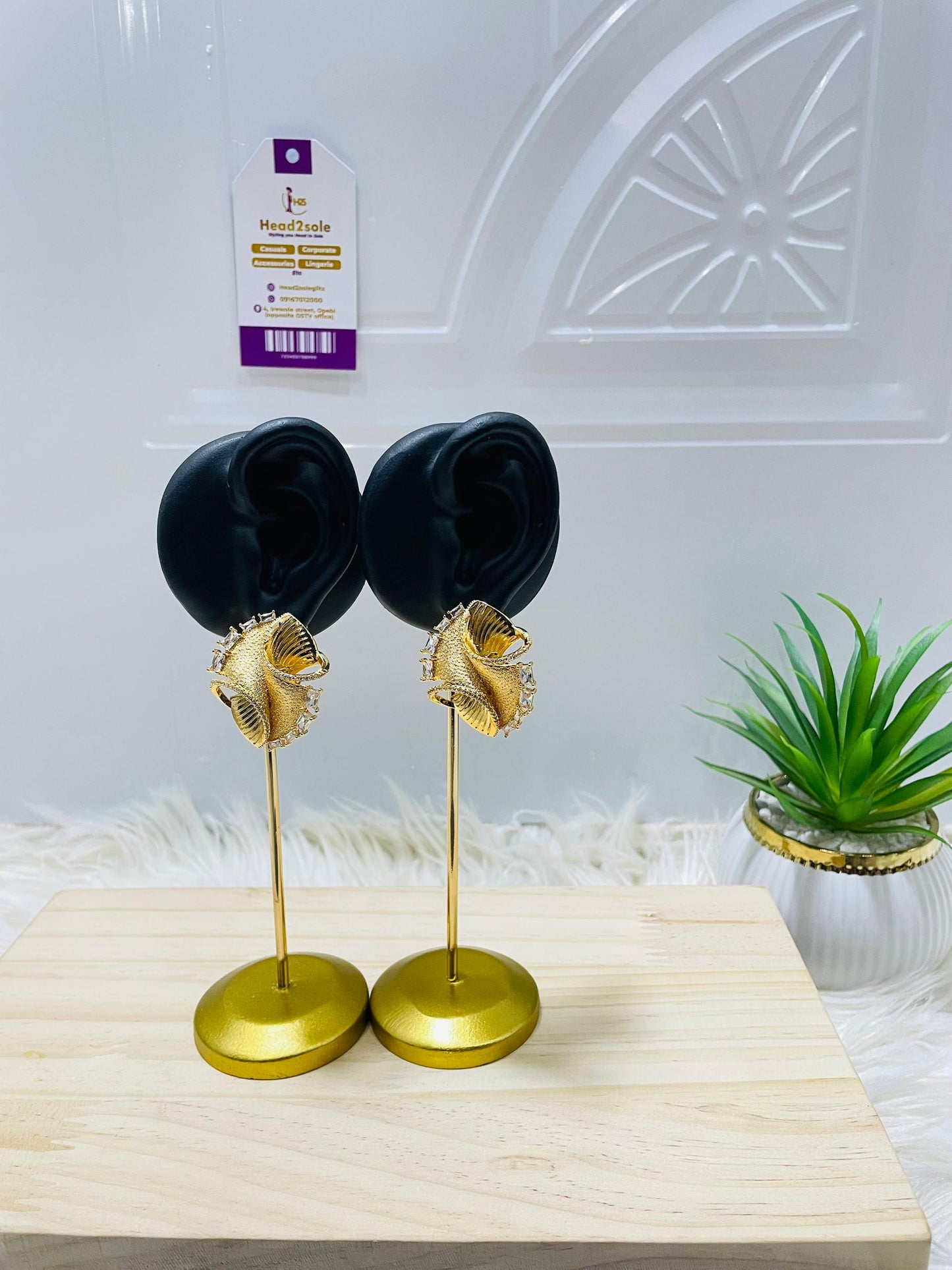 Shell textured twisted cubic zirconia earrings