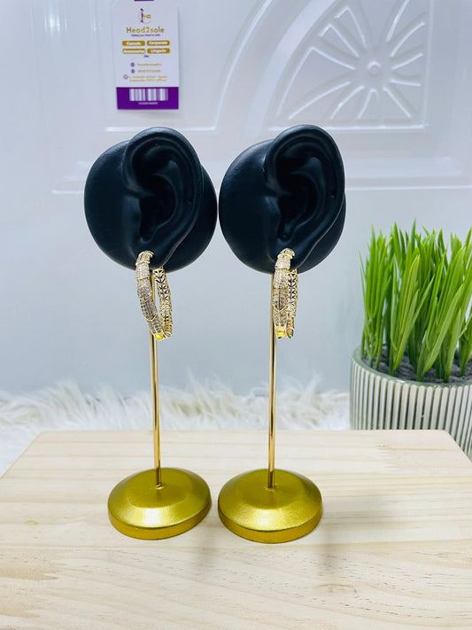 Crystal studded gold tone hoop earrings